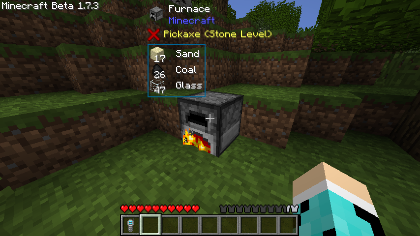 Image showing the user looking at a furnace block with probe information about the furnace block visible on screen