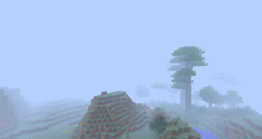 The fog is rounded, in an area with a extreme hills biome and a jungle.