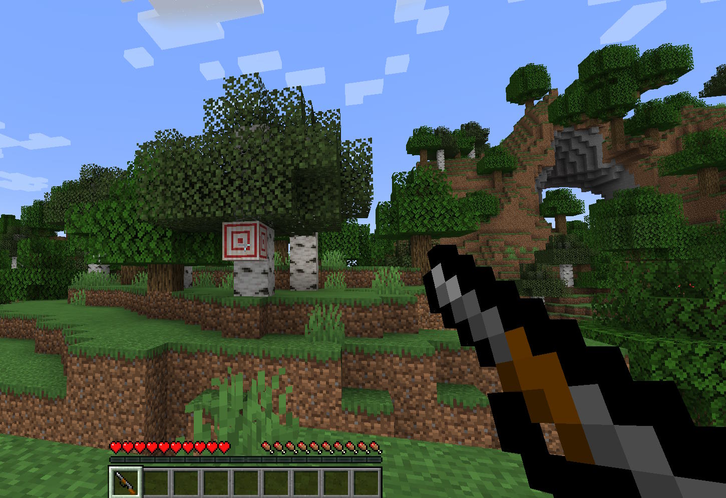 A shotgun in Minecraft held by the player.