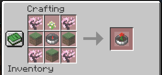 The recipe of the Biome Locator, consisting of 4 saplings in the corners, 3 dirt blocks in the left, bottom, and right middle, a flower in the top middle, and a compass in the middle middle.