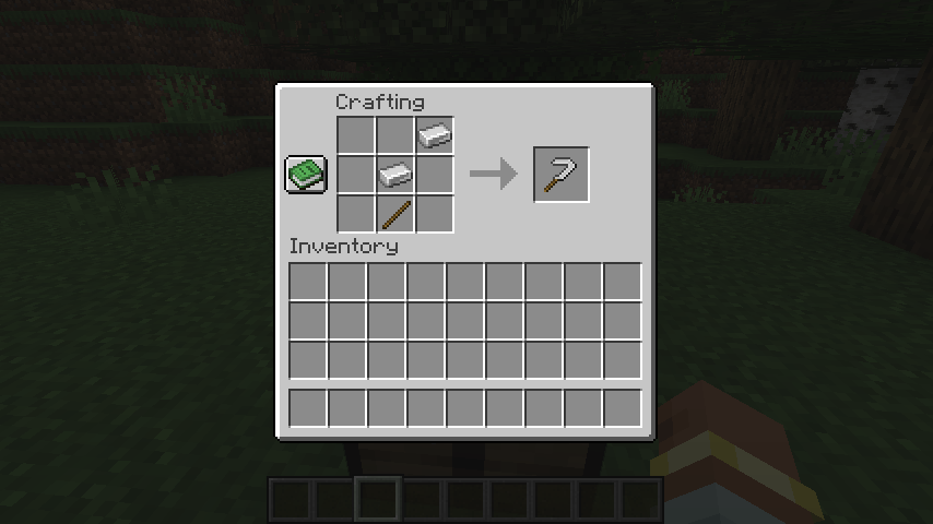 Iron sickle crafting recipie. It has a stick in the middle bottom, an iron ingot above that with another iron ingot diagonally above that one.