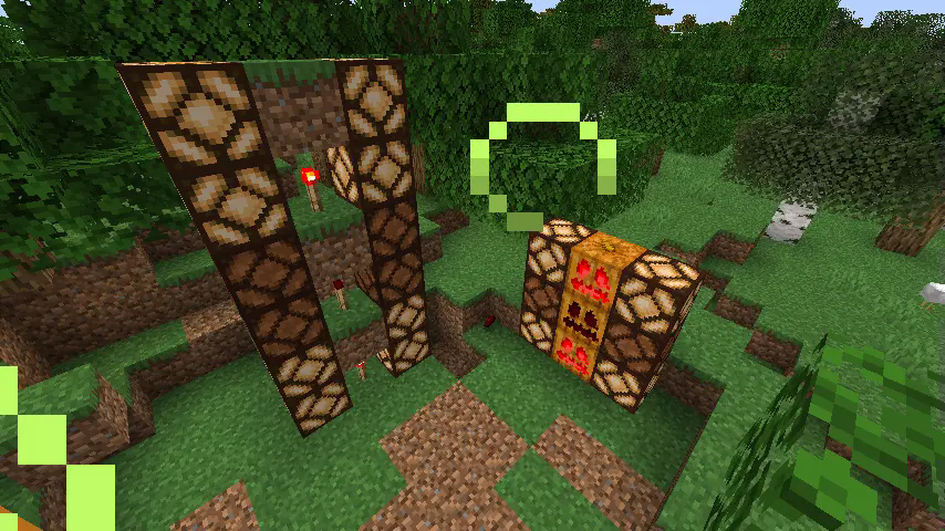 redstone pumpkins next to stacked redstone torches