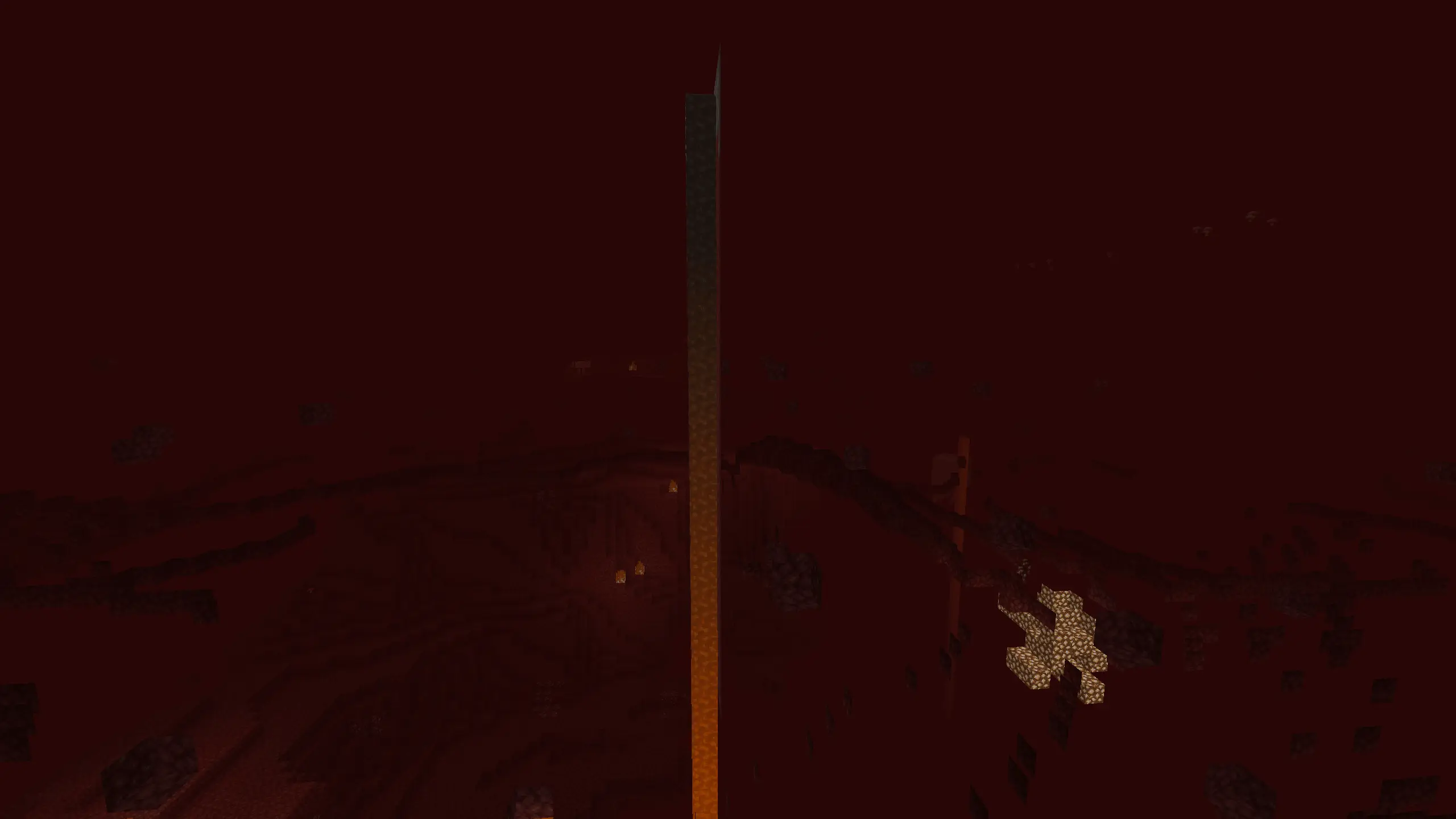 Player being in spectator while lava gets darker closer to bedrock in the nethere (the nether roof)