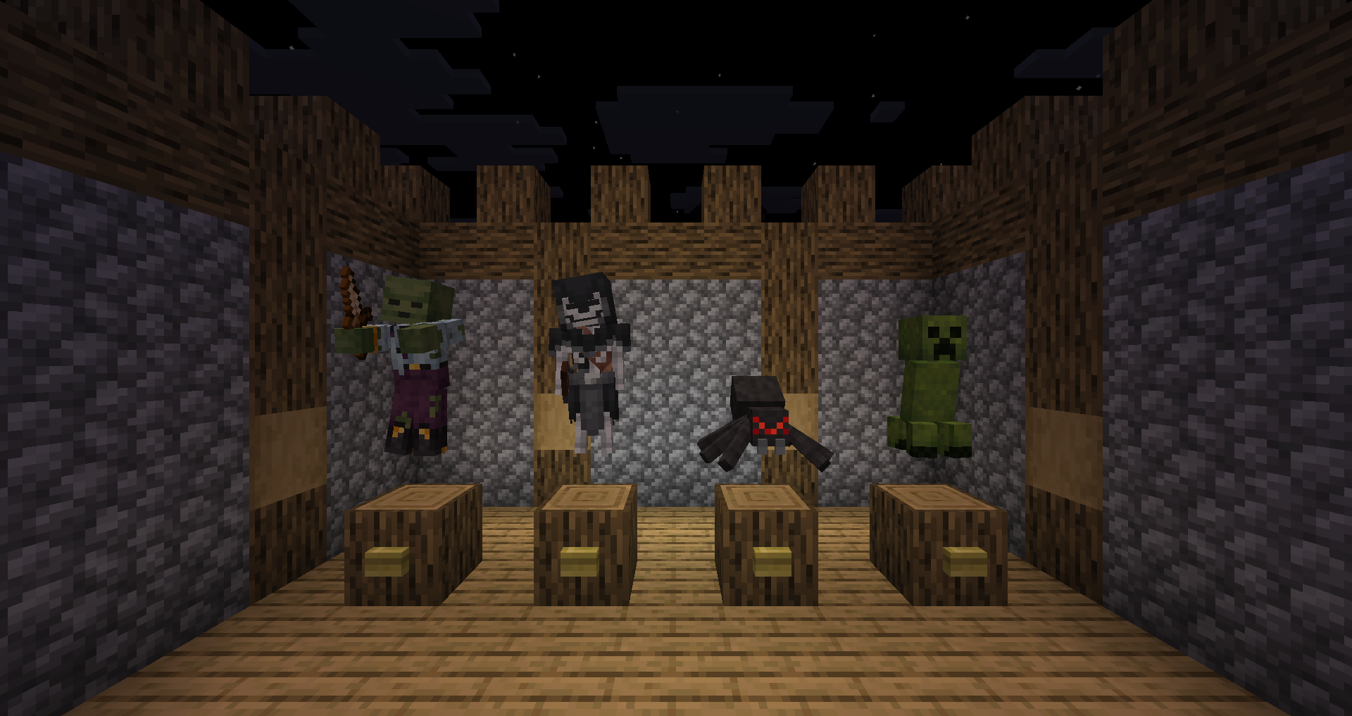 A zombie, skeleton, spider and creeper displayed above oak logs