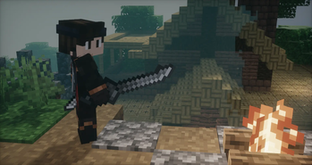 Corvin nearby a campfire