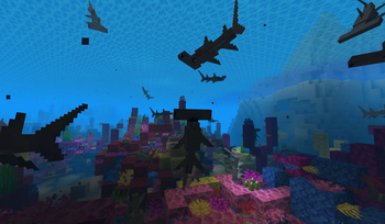 School of Sharks in Reef