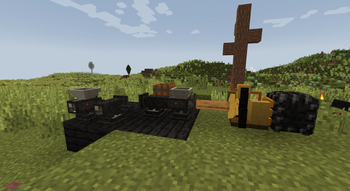 Grinder and expeller press being powered by a small engine