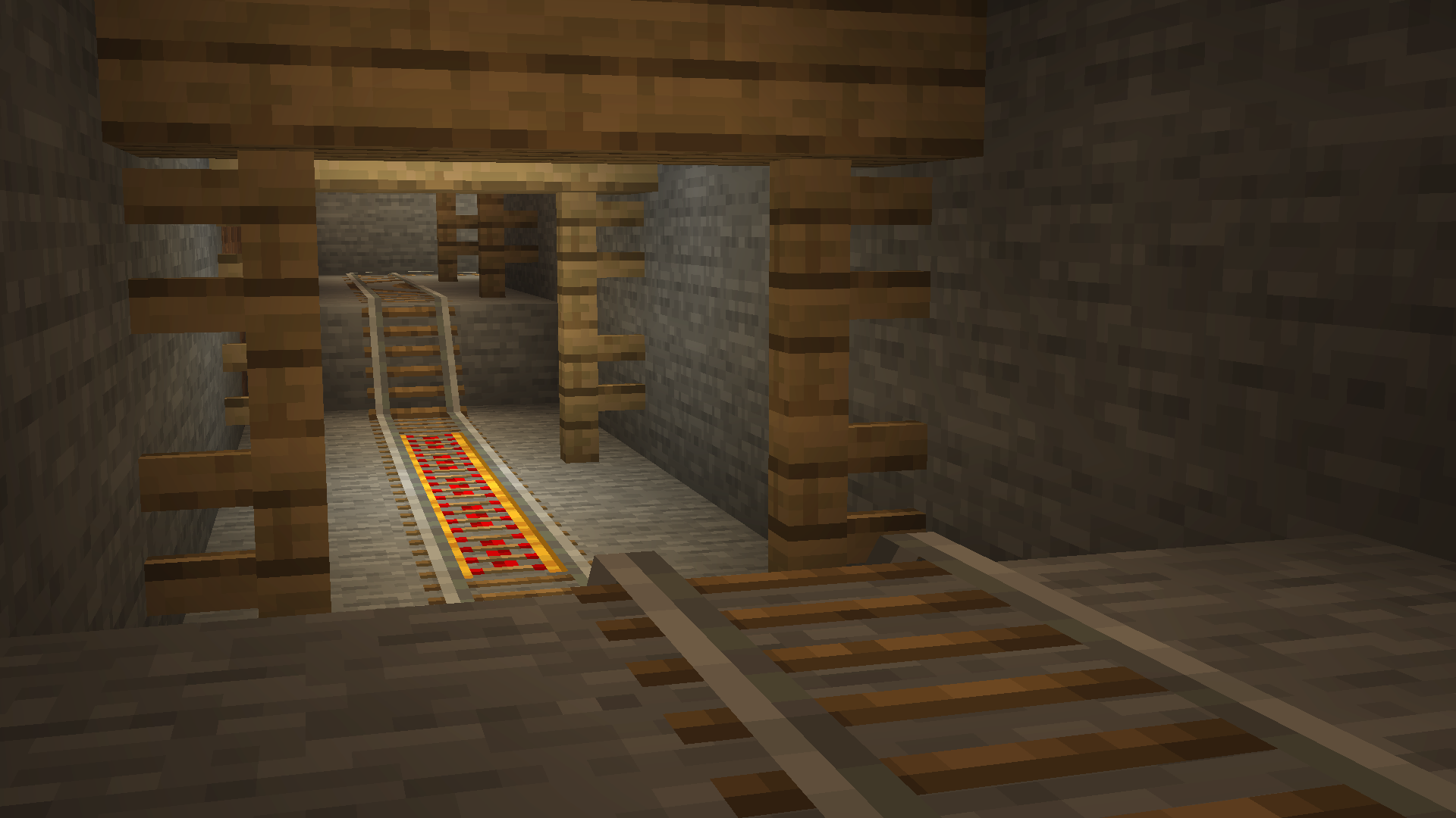 Minecraft scene showcasing remodeled rails in a mineshaft