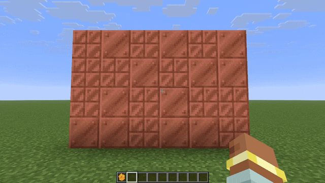 Player switching between empty hand and honeycomb while facing wall of copper blocks, when the honeycomb is held blocks on the right half have a yellow outline