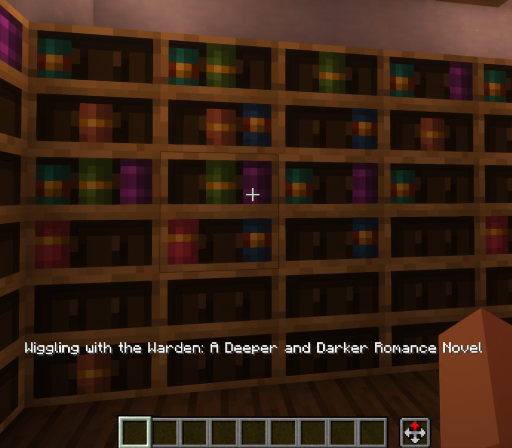 Shows a Minecraft player looking at a row of chiseled bookshelves and the title of the book they are looking at is displayed in the player's action bar. The book title is Wiggling with the Warden: A Deeper and Darker Romance Novel