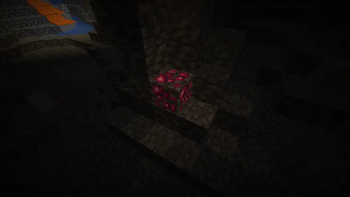 Heart Crystal Ore in a cave emitting light