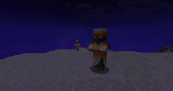 dark-skinned desert villager with tan-skinned villager behind