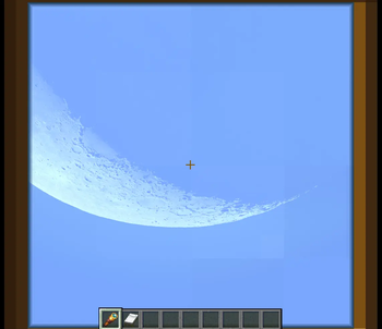 Zoom on the southern lunar crescent during the day