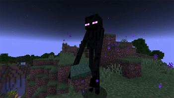 Enderman holding a grass block