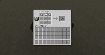 Crafting a iron pickaxe.