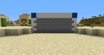 Stone bricks overlay the wall