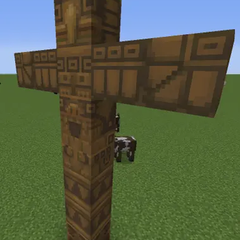 Carved spruce totem