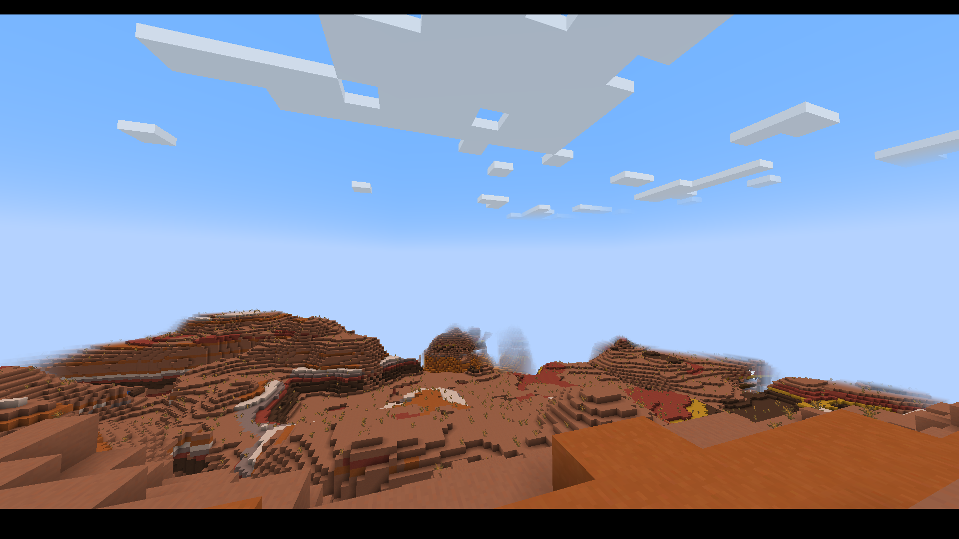 A screenshot of a Badlands biome with the modpack installed.