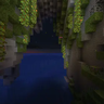 Panorama of a lush cave lake in a cliff during sunset