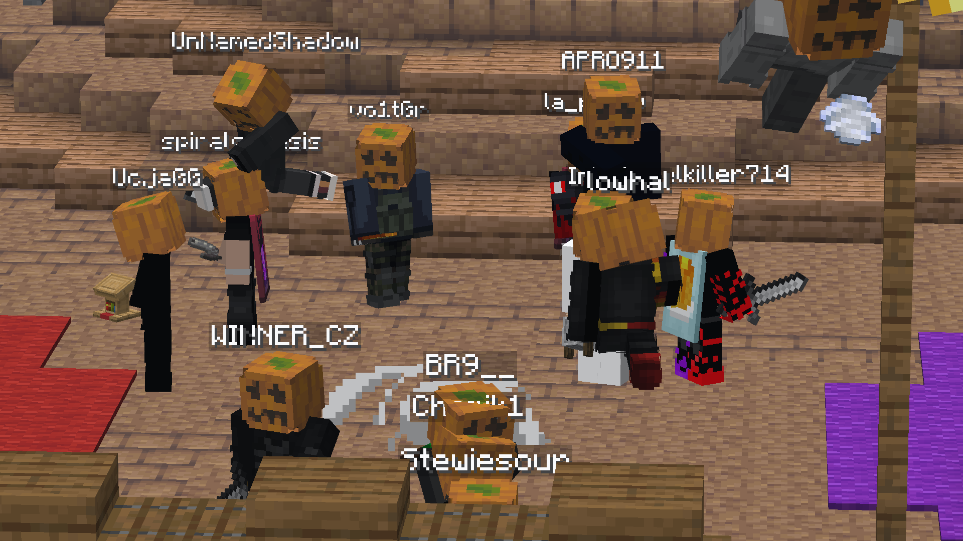 a crowd of people all wearing pumpkin forceskin on their head