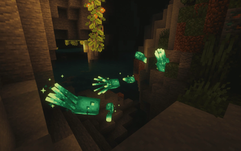 Glowing Squids In A Cave