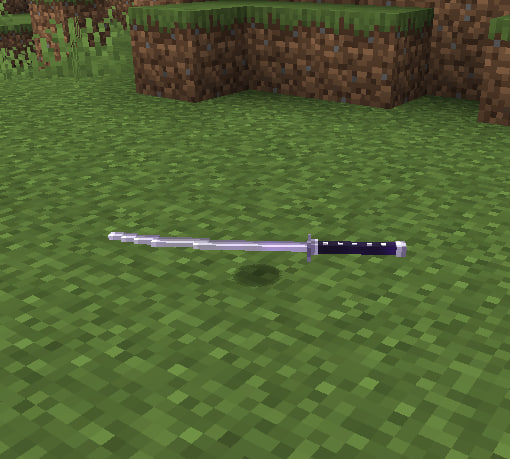 A katana lying on the ground, having been discarded.