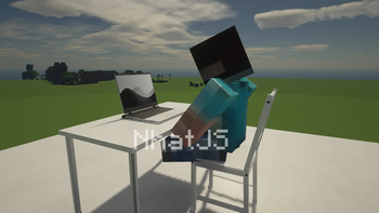 Full view of player sit chair and work with laptop! View A