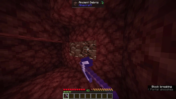An iron pickaxe with Almighty