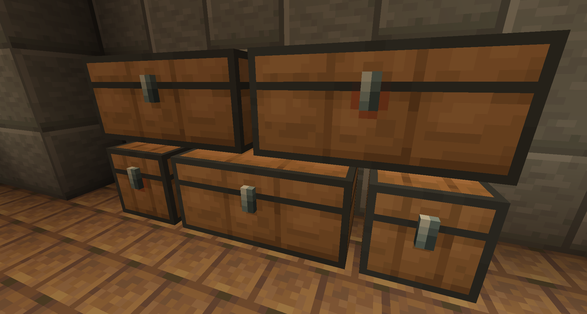 A wall of chests from the resourcepack, two normal and one large on the bottom and two large on top. The bottom left and top right are trapped chests.