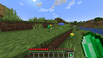 A dropped emerald about to despawn