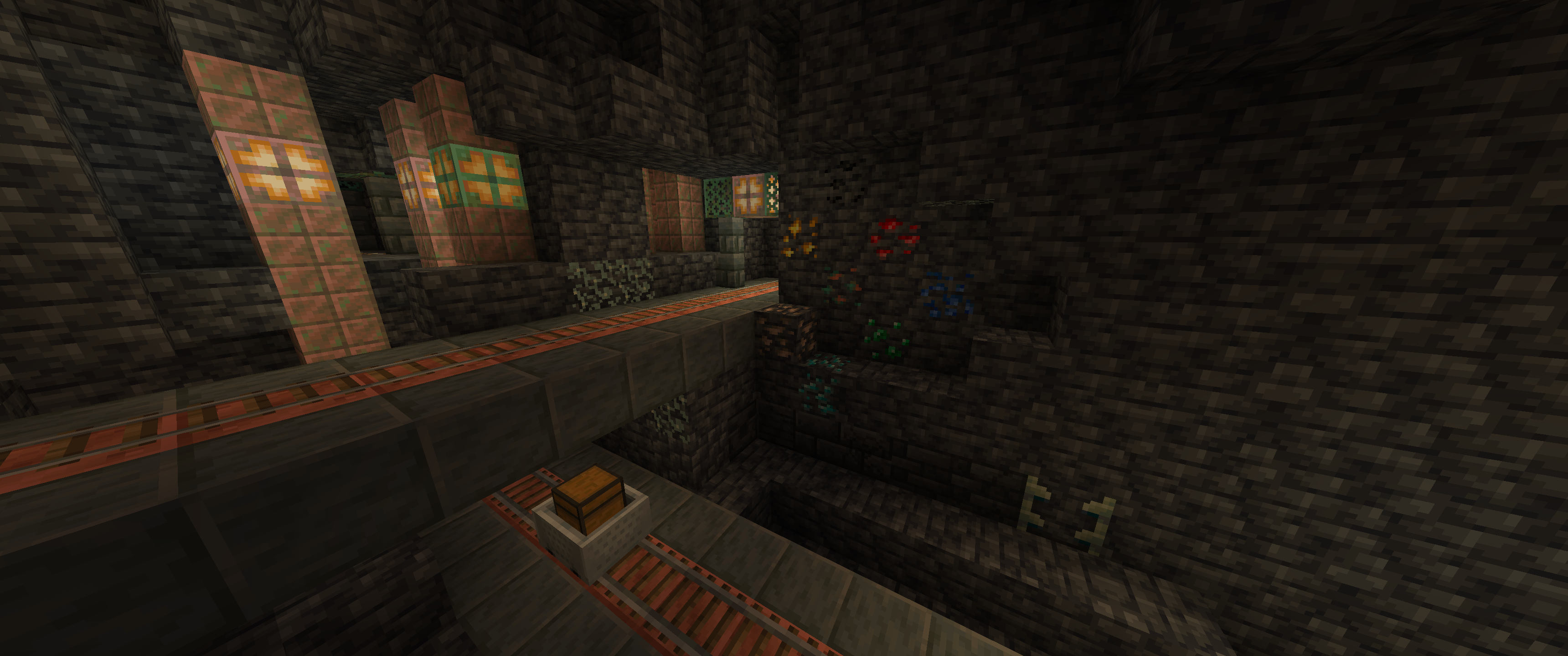 a picture of all deepslate block variants showcased by a player-made decorated copper mineshaft