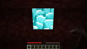 Ancient Debris that is glowing bright blue against red Netherrack in the dark. This version requires OptiFine.