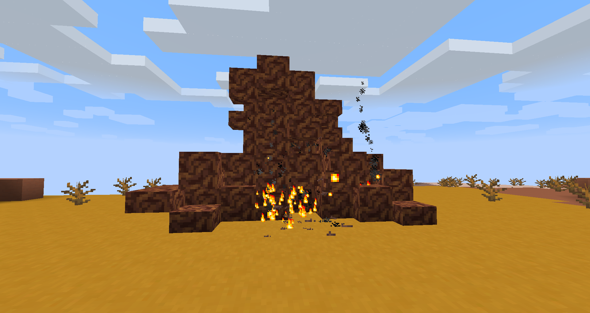 A mound of kindling starting to burn