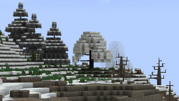 White cherry tree on the top of a mountain.